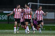 1 March 2024; Patrick Hoban of Derry City celebrates with teammates, including Michael Duffy, left, after scoring their side's first goal during the SSE Airtricity Men's Premier Division match between Derry City and St Patrick's Athletic at The Ryan McBride Brandywell Stadium in Derry. Photo by Ben McShane/Sportsfile