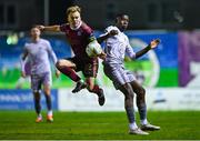 1 March 2024; Conor McCormack of Galway United in action against Romeo Akachukwu of Waterford during the SSE Airtricity Men's Premier Division match between Galway United and Waterford at Eamonn Deacy Park in Galway. Photo by Tyler Miller/Sportsfile