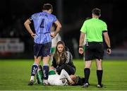 1 March 2024; Jack Doherty of Cork City receives medical attention from physiotherapist Orla McSweeney during the SSE Airtricity Men's First Division match between Cork City and UCD at Turner's Cross in Cork. Photo by Michael P Ryan/Sportsfile