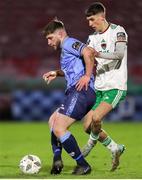 1 March 2024; Alex Dunne of UCD in action against John O'Donovan of Cork City during the SSE Airtricity Men's First Division match between Cork City and UCD at Turner's Cross in Cork. Photo by Michael P Ryan/Sportsfile