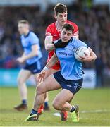 2 March 2024; Brian Howard of Dublin in action against Shane McGuigan of Derry during the Allianz Football League Division 1 match between Derry and Dublin at Celtic Park in Derry. Photo by David Fitzgerald/Sportsfile