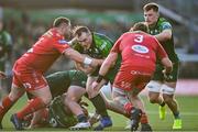 2 March 2024; Peter Dooley of Connacht is tackled by Wyn Jones of Scarlets during the United Rugby Championship match between Connacht and Scarlets at Dexcom Stadium in Galway. Photo by Stephen Marken/Sportsfile