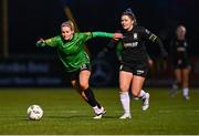 2 March 2024; Erin McLaughlin of Peamount United in action against Laurie Ryan of Athlone Town during the 2024 Women's President's Cup match between Athlone Town and Peamount United at Athlone Town Stadium in Athlone, Westmeath. Photo by Tyler Miller/Sportsfile