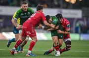 2 March 2024; Caolin Blade of Connacht is tackled by Jac Price and Dan Jones, 10, of Scarlets during the United Rugby Championship match between Connacht and Scarlets at Dexcom Stadium in Galway. Photo by Stephen Marken/Sportsfile
