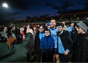 2 March 2024; Con O'Callaghan of Dublin with supporters after the Allianz Football League Division 1 match between Derry and Dublin at Celtic Park in Derry. Photo by David Fitzgerald/Sportsfile
