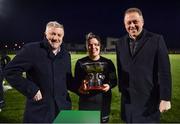 2 March 2024; Laurie Ryan of Athlone Town is presented with the President's Cup by FAI President Paul Cooke, left, and Minister of State for Sport and Physical Education Thomas Byrne TD after the 2024 Women's President's Cup match between Athlone Town and Peamount United at Athlone Town Stadium in Athlone, Westmeath. Photo by Tyler Miller/Sportsfile