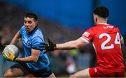 2 March 2024; Cormac Costello of Dublin in action against Padraig McGrogan of Derry during the Allianz Football League Division 1 match between Derry and Dublin at Celtic Park in Derry. Photo by David Fitzgerald/Sportsfile