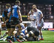 2 March 2024; Luke McGrath of Leinster celebrates as teammate Max Deegan, bottom, scores his side's second try during the United Rugby Championship match between Cardiff and Leinster at Cardiff Arms Park in Cardiff, Wales. Photo by Harry Murphy/Sportsfile