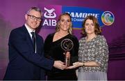2 March 2024; Aoife Prendergast of Dicksboro, Kilkenny, centre, is presented with her 2023 Team of the Year award by Uachtarán an Cumann Camógaíochta, Hilda Breslin and Chief Marketing Officer of AIB, Mark Doyle during the AIB Camogie Club Player Awards at Croke Park in Dublin. The awards recognise the top performing players throughout the AIB Camogie Club Championships and celebrate their hard work, commitment, and individual achievements from the 2023 season. Photo by Seb Daly/Sportsfile