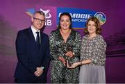 2 March 2024; Kirsty Maher of Dicksboro, Kilkenny, centre, is presented with her 2023 Team of the Year award by Uachtarán an Cumann Camógaíochta, Hilda Breslin and Chief Marketing Officer of AIB, Mark Doyle during the AIB Camogie Club Player Awards at Croke Park in Dublin. The awards recognise the top performing players throughout the AIB Camogie Club Championships and celebrate their hard work, commitment, and individual achievements from the 2023 season. Photo by Seb Daly/Sportsfile