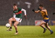 2 March 2024; Jordan Flynn of Mayo in action against Robbie Dolan of Roscommon during the Allianz Football League Division 1 match between Mayo and Roscommon at Hastings Insurance MacHale Park in Castlebar, Mayo. Photo by Piaras Ó Mídheach/Sportsfile