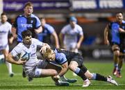 2 March 2024; Harry Byrne of Leinster is tackled by Tinus De Beer of Cardiff during the United Rugby Championship match between Cardiff and Leinster at Cardiff Arms Park in Cardiff, Wales. Photo by Harry Murphy/Sportsfile