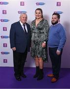 2 March 2024; Kirsty Maher of Dicksboro, Kilkenny, with her grandfather Richard Maher, left, and uncle Damien Maher on arrival at the AIB Camogie Club Player Awards at Croke Park in Dublin. Photo by Seb Daly/Sportsfile