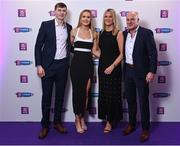 2 March 2024; Asha McHardy of Dicksboro, Kilkenny, second from left, with partner Eoin Deely, left, and Genevieve and Jamie McHardy on arrival at the AIB Camogie Club Player Awards at Croke Park in Dublin. Photo by Seb Daly/Sportsfile