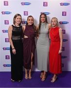 2 March 2024; Dicksboro, Kilkenny, players Ciara Phelan, second from left, and Aobhe O'Gorman, with their mothers Noreen Phelan and Siobhan O'Gorman on arrival at the AIB Camogie Club Player Awards at Croke Park in Dublin. Photo by Seb Daly/Sportsfile