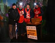 2 March 2024; Former Taoiseach Enda Kenny, left, with stewards, from left, Kevin Durcan, Noel Browne and Gerry McDonnell, all from the Castlebar Mitchels club, at a match programme stand, before the Allianz Football League Division 1 match between Mayo and Roscommon at Hastings Insurance MacHale Park in Castlebar, Mayo. Photo by Piaras Ó Mídheach/Sportsfile