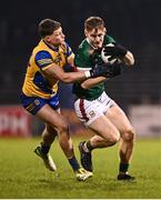 2 March 2024; Jack Carney of Mayo in action against Conor Cox of Roscommon during the Allianz Football League Division 1 match between Mayo and Roscommon at Hastings Insurance MacHale Park in Castlebar, Mayo. Photo by Piaras Ó Mídheach/Sportsfile