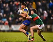2 March 2024; Conor Cox of Roscommon in action against Sam Callinan of May during the Allianz Football League Division 1 match between Mayo and Roscommon at Hastings Insurance MacHale Park in Castlebar, Mayo. Photo by Piaras Ó Mídheach/Sportsfile