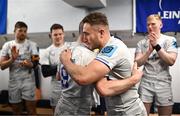 2 March 2024; Jordan Larmour of Leinster is presented a jersey by teammate Luke McGrath after making his 100th appearance in the United Rugby Championship match between Cardiff and Leinster at Cardiff Arms Park in Cardiff, Wales. Photo by Harry Murphy/Sportsfile