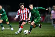 1 March 2024; Adam O'Reilly of Derry City and Chris Forrester of St Patrick's Athletic during the SSE Airtricity Men's Premier Division match between Derry City and St Patrick's Athletic at The Ryan McBride Brandywell Stadium in Derry. Photo by Ben McShane/Sportsfile