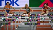 3 March 2024; Maayke Tjin-A-Lim of Netherlands, left, Sarah Lavin of Ireland and Yanni Wu of China, right, compete in their heat of the Women's 60m hurdles during day three of the World Indoor Athletics Championships 2024 at Emirates Arena in Glasgow, Scotland. Photo by Sam Barnes/Sportsfile