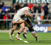 2 March 2024; Jude Postlethwaite of Ulster is tackled by Dane Blacker of the Dragons during the United Rugby Championship match between Ulster and Dragons at Kingspan Stadium in Belfast. Photo by John Dickson/Sportsfile