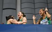 3 March 2024; Members of the Ireland relay team, from left, Phil Healy, Sophie Becker and Sharlene Mawdsley celebrate after qualifying for the women's 4x400m relay final with a national record of 3:28.45 during day three of the World Indoor Athletics Championships 2024 at Emirates Arena in Glasgow, Scotland. Photo by Sam Barnes/Sportsfile