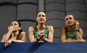 3 March 2024; Ireland women's 4x400m relay team members, from left, Phil Healy, Sophie Becker and Sharlene Mawdsley wait to see if they have qualified for the women's 4x400m relay final during day three of the World Indoor Athletics Championships 2024 at Emirates Arena in Glasgow, Scotland. Photo by Sam Barnes/Sportsfile