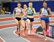 3 March 2024; Roisin Harrison of Ireland, centre, competes the women's 4x400m relay during day three of the World Indoor Athletics Championships 2024 at Emirates Arena in Glasgow, Scotland. Photo by Sam Barnes/Sportsfile