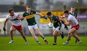 3 March 2024; Adrian Spillane of Kerry is tackled by Ben Cullen of Tyrone during the Allianz Football League Division 1 match between Kerry and Tyrone at Fitzgerald Stadium in Killarney, Kerry. Photo by Brendan Moran/Sportsfile