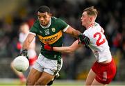 3 March 2024; Stefan Okunbor of Kerry is tackled by Lorcan McGarrity of Tyrone during the Allianz Football League Division 1 match between Kerry and Tyrone at Fitzgerald Stadium in Killarney, Kerry. Photo by Brendan Moran/Sportsfile