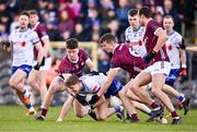 3 March 2024; Michael Hamill of Monaghan is tackled by Galway players, from left, Seán Kelly, John Daly and John Maher during the Allianz Football League Division 1 match between Monaghan and Galway at St Tiernach's Park in Clones, Monaghan. Photo by Ben McShane/Sportsfile