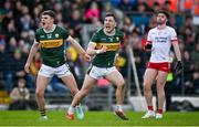 3 March 2024; Paudie Clifford of Kerry, centre, celebrates with teammate Seán O'Shea after kicking a point during the Allianz Football League Division 1 match between Kerry and Tyrone at Fitzgerald Stadium in Killarney, Kerry. Photo by Brendan Moran/Sportsfile