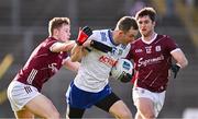 3 March 2024; Jack McCarron of Monaghan in action against Johnny McGrath, left, and Cathal Sweeney of Galway during the Allianz Football League Division 1 match between Monaghan and Galway at St Tiernach's Park in Clones, Monaghan. Photo by Ben McShane/Sportsfile