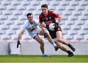 3 March 2024; Chris Óg Jones of Cork gets past Eoin Doyle of Kildare during the Allianz Football League Division 2 match between Cork and Kildare at SuperValu Páirc Ui Chaoimh in Cork. Photo by Piaras Ó Mídheach/Sportsfile