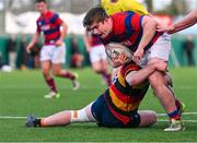 3 March 2024; David Dowse of Clontarf FC is tackled by Paul Wilson of Lansdowne FC during the JP Fanagan League match between Lansdowne FC and Clontarf FC at Lansdowne RFC in Dublin. Photo by Tyler Miller/Sportsfile