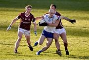 3 March 2024; Kevin Loughran of Monaghan in action against Jack Glynn, left, and John Maher of Galway during the Allianz Football League Division 1 match between Monaghan and Galway at St Tiernach's Park in Clones, Monaghan. Photo by Ben McShane/Sportsfile