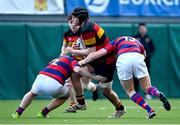 3 March 2024; Luke O'Connor of Lansdowne FC is tackled by David Dowse, left, and Theo Connolly of Clontarf FC during the JP Fanagan League match between Lansdowne FC and Clontarf FC at Lansdowne RFC in Dublin. Photo by Tyler Miller/Sportsfile