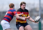 3 March 2024; Oisin Lynch of Lansdowne FC in action against Daniel Baugh of Clontarf FC during the JP Fanagan League match between Lansdowne FC and Clontarf FC at Lansdowne RFC in Dublin. Photo by Shauna Clinton/Sportsfile