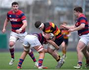 3 March 2024; Tomas Noone of Lansdowne FC is tackled by Lucas Sherwood of Clontarf FC during the JP Fanagan League match between Lansdowne FC and Clontarf FC at Lansdowne RFC in Dublin. Photo by Shauna Clinton/Sportsfile