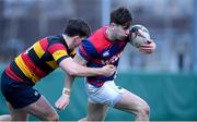3 March 2024; Stephen Ryan of Clontarf FC in action against Jamie Maguire of Lansdowne FC during the JP Fanagan League match between Lansdowne FC and Clontarf FC at Lansdowne RFC in Dublin. Photo by Shauna Clinton/Sportsfile
