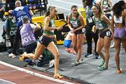 3 March 2024; Sharlene Mawdsley of Ireland is cheered on by teammates Phil Healy and Sophie Becker during the Women's 4 x 400m Relay Final on day three of the World Indoor Athletics Championships 2024 at Emirates Arena in Glasgow, Scotland. Photo by Sam Barnes/Sportsfile