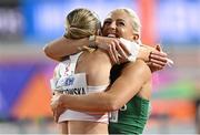 3 March 2024; Pia Skrzyszowska of Poland, left, is congratulated on winning bronze by Sarah Lavin of Ireland after the Women's 60m Hurdles Final day three of the World Indoor Athletics Championships 2024 at Emirates Arena in Glasgow, Scotland. Photo by Sam Barnes/Sportsfile