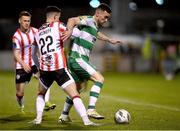 4 March 2024; Aaron Greene of Shamrock Rovers in action against Jordan McEneff of Derry City during the SSE Airtricity Men's Premier Division match between Shamrock Rovers and Derry City at Tallaght Stadium in Dublin. Photo by David Fitzgerald/Sportsfile