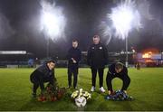 4 March 2024; In attendance, from left, Drogheda United kit manager Barry Sanfey, League of Ireland director Mark Scanlon, FAI kit manager Stephen Egan and Bohemians kit manager Colin O'Connor make their way to the centre circle to place wreaths in memory of the late former Drogehda United kit manager Brendan Penrose before the SSE Airtricity Men's Premier Division match between Drogheda United and Bohemians at Weavers Park in Drogheda, Louth. Photo by Ben McShane/Sportsfile