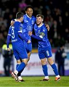 4 March 2024; Padraig Amond of Waterford, 9, celebrates with team-mates Maleace Asamoah and Barry Begley, right, after scoring their side's first goal during the SSE Airtricity Men's Premier Division match between Waterford and St Patrick's Athletic at the Regional Sports Centre in Waterford. Photo by Piaras Ó Mídheach/Sportsfile