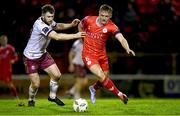 4 March 2024; JJ Lunney of Shelbourne in action against Karl O'Sullivan of Galway United during the SSE Airtricity Men's Premier Division match between Shelbourne and Galway United at Tolka Park in Dublin. Photo by Harry Murphy/Sportsfile