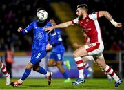 4 March 2024; Padraig Amond of Waterford in action against Conor Keeley of St Patrick's Athletic during the SSE Airtricity Men's Premier Division match between Waterford and St Patrick's Athletic at the Regional Sports Centre in Waterford. Photo by Piaras Ó Mídheach/Sportsfile