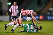 4 March 2024; Shane McEleney of Derry City in action against Markus Poom of Shamrock Rovers during the SSE Airtricity Men's Premier Division match between Shamrock Rovers and Derry City at Tallaght Stadium in Dublin. Photo by Stephen McCarthy/Sportsfile