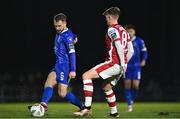 4 March 2024; Rowan McDonald of Waterford in action against Chris Forrester of St Patrick's Athletic during the SSE Airtricity Men's Premier Division match between Waterford and St Patrick's Athletic at the Regional Sports Centre in Waterford. Photo by Piaras Ó Mídheach/Sportsfile